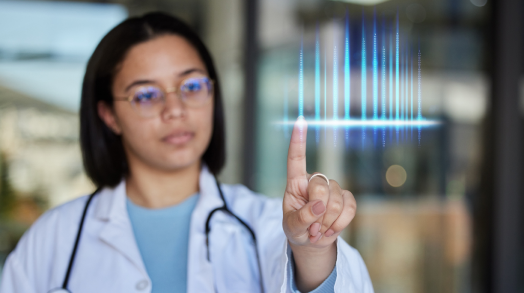 a female doctor uses her finger to influence a technology based image